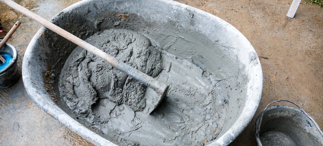 mixing concrete in a bucket