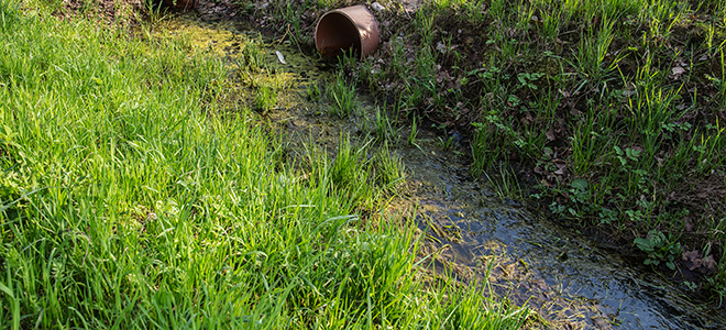 A french drain pipe with water