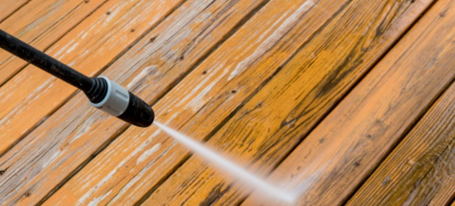 pressure washer cleaning deck