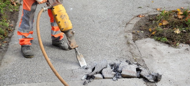 person using a jackhammer