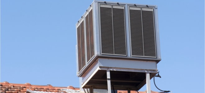 evaporative cooler on a stucco roof