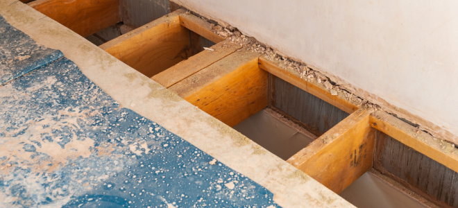 floor joists exposed under boards