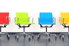 Colorful swivel chairs in a row.