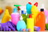 various colorful chemical product bottles
