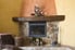 Corner fireplace with a mantel