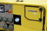 A yellow portable power generator