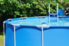 a blue, above ground pool