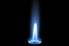 A blue flame against a black background.