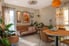 seventies interior design with plants and orange themes