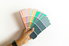 A handful of paint color sample cards.