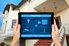 A smart house app open on a tablet.