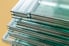 A stack of tempered glass sheets.
