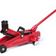 A red, hydraulic floor jack isolated on a white background.