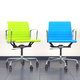 Colorful swivel chairs in a row.