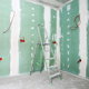 room with sheetrock, taped, and mud walls