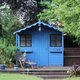 building a she shed vs. installing a sunroom