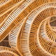a curving design made from many pieces of wood