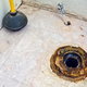 rusted wax ring below toilet