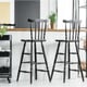 two barstools in a clean, stylish kitchen