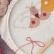 needle point embroidery design with yarn and tool