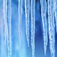 Long spiky icicles with a blue background. 