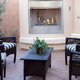 patio with furniture and fireplace