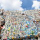 Stacks of plastic bottles waiting to be recycled. 