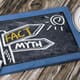 A small chalkboard with the words "fact" and "myth" written on it. 