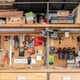 organized workshop with tools hanging on wall