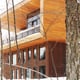 modern wood house in snowy forest