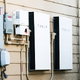 Tesla wall inverter and power battery on exterior wall