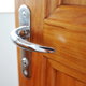 lever doorknob on a wooden door