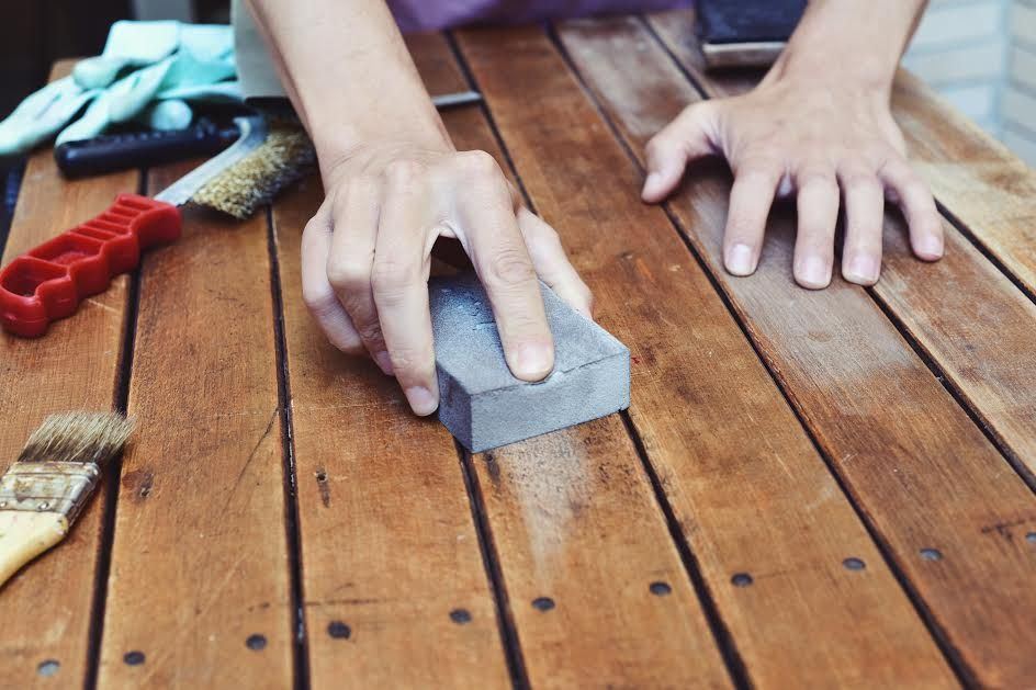 Sanding wood. 