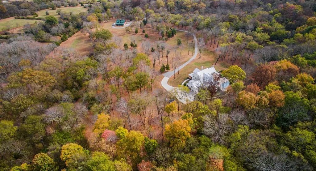 Aerial view of the autumn woods around Miley Cyrus' Nashville farmhouse.