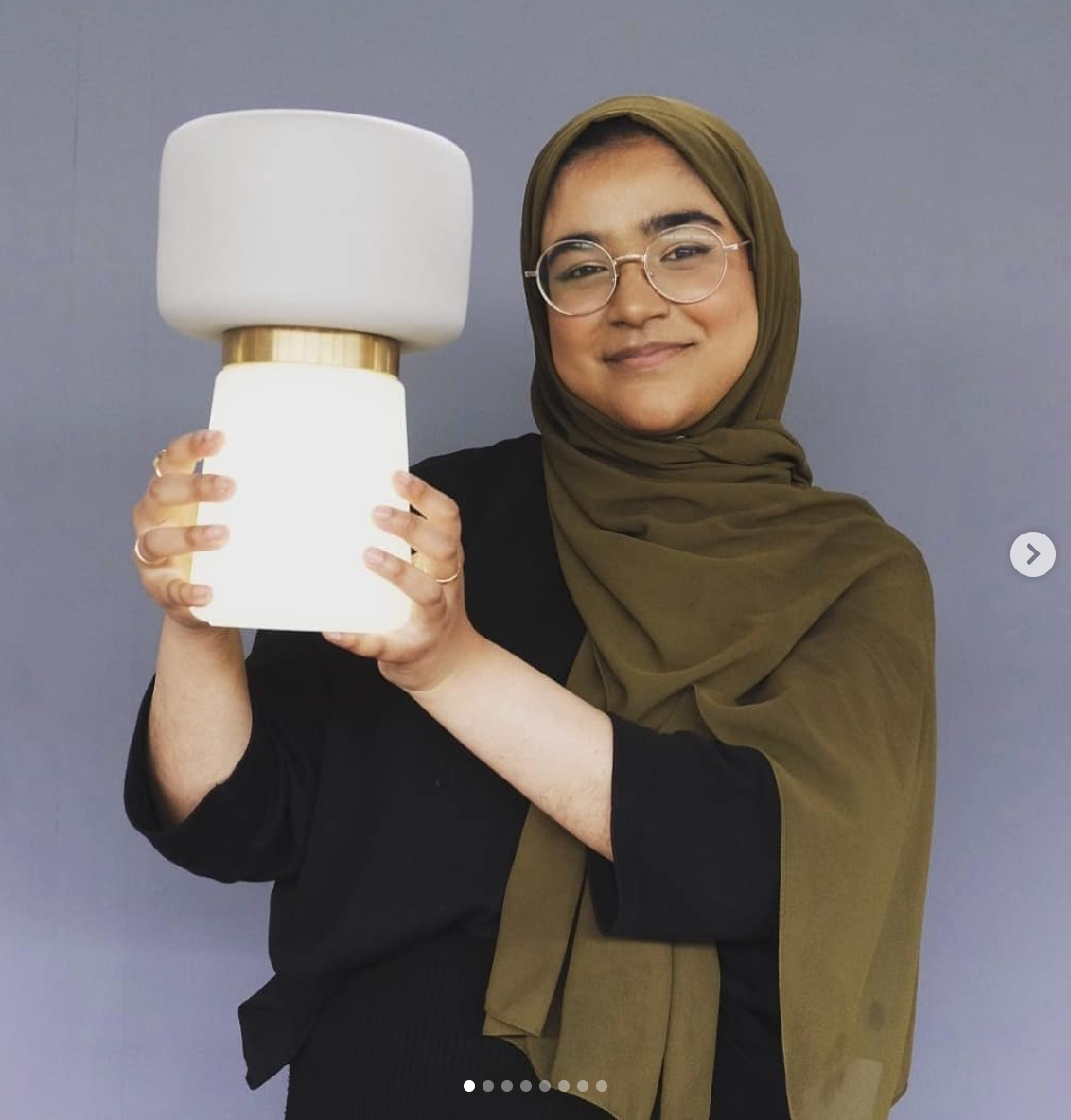 Ceramicist Soyida Akhtar proudly holds up one of her modular Wedgwood lamps.