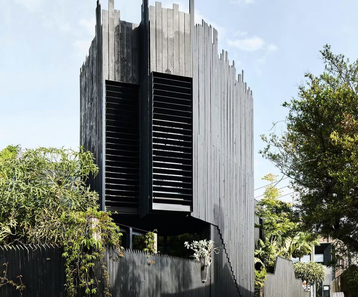 Spiky black house in Melbourne, Australia by architects Asha Nicholas and Chris Stanley of Splinter Society.