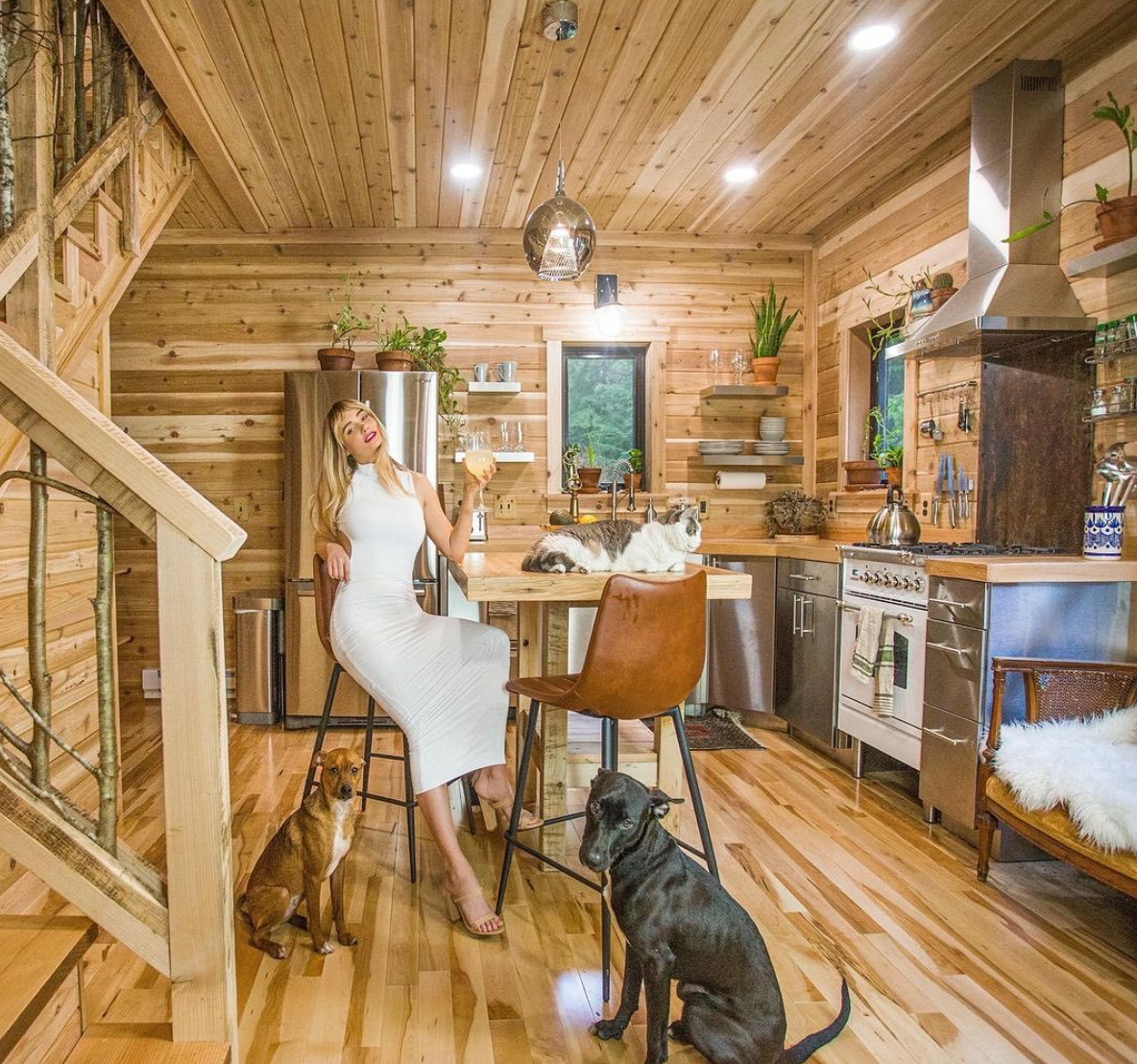 Sara Underwood poses with her dogs inside the fairytale 