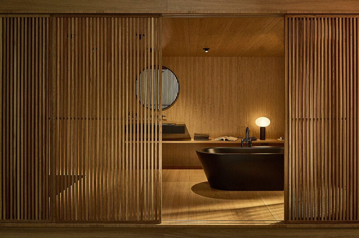 Tranquil wood-dominated luxury bathroom set-up on display at Bette's headquarters in Delbrück, Germany.
