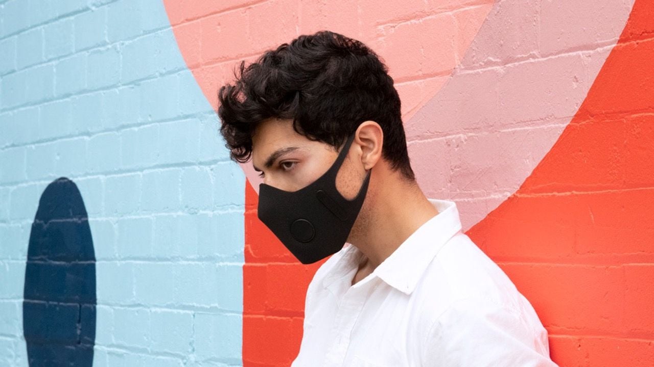 Young man sports a sleek AusAir Anti-Pollution Mask. 