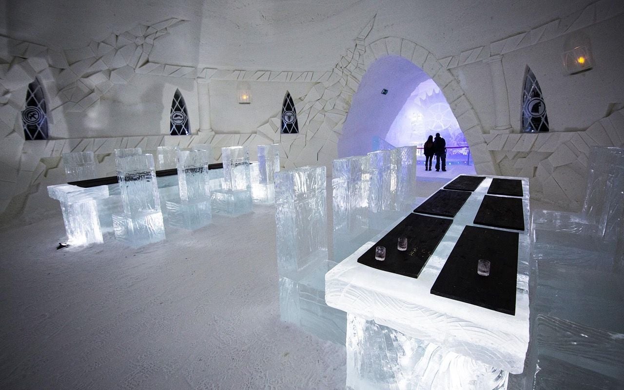 The all-white restaurant inside the Lapland Hotels SnowVillage 