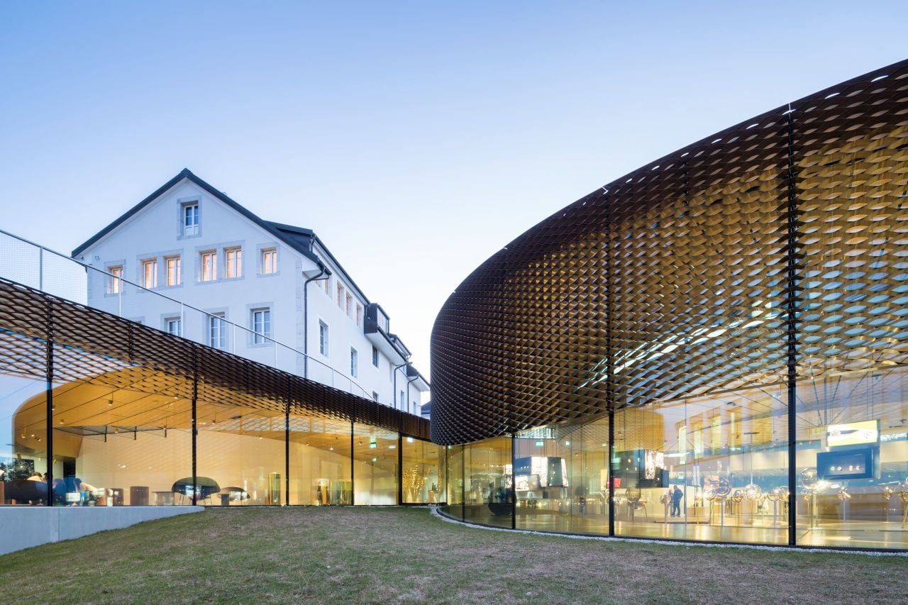 A protective honeycomb shade screen keeps the museum's exposed interiors cool and shaded at all times. 