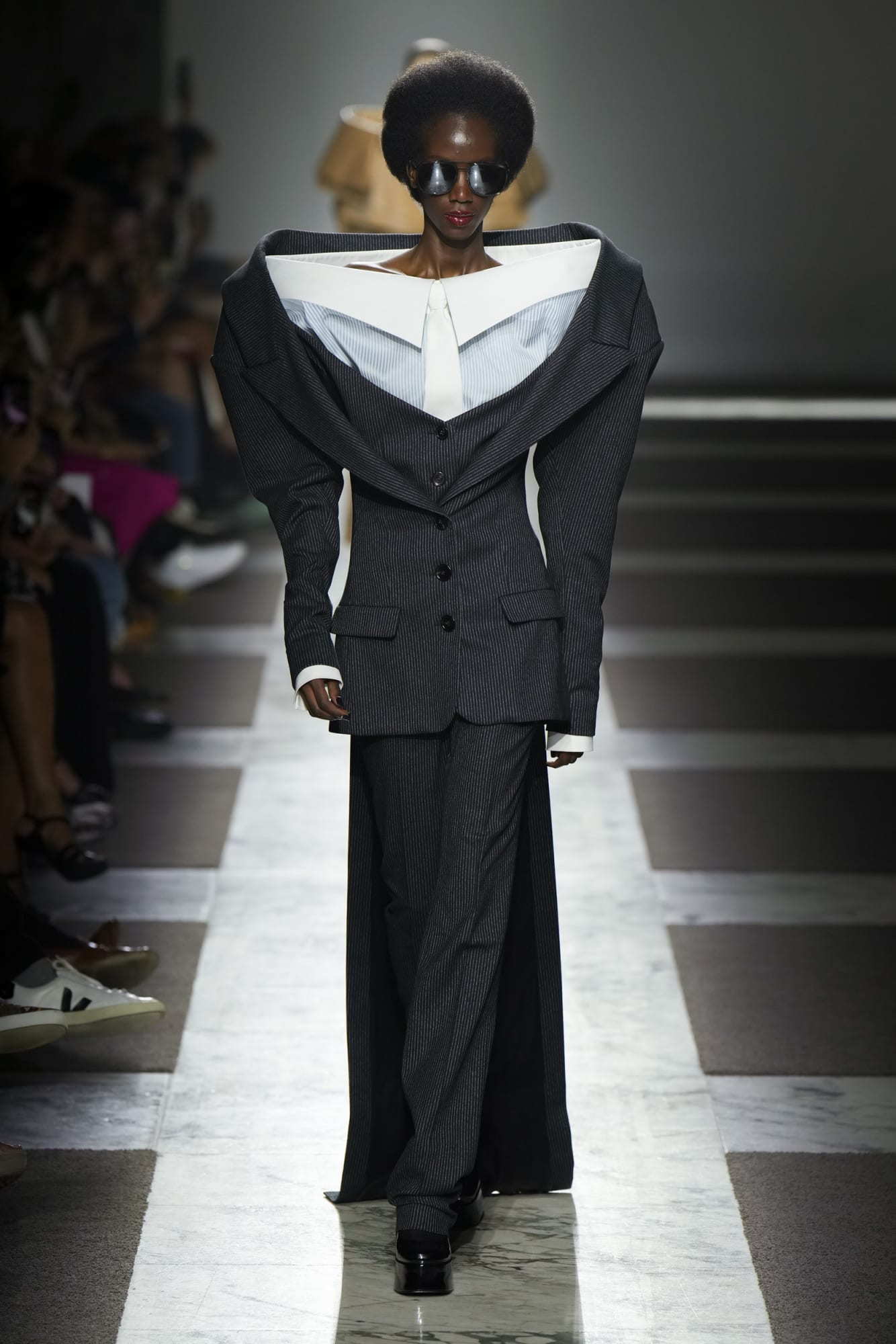  Viktor & Rolf model sports an oversized jacket for Paris Fashion Week 2022.