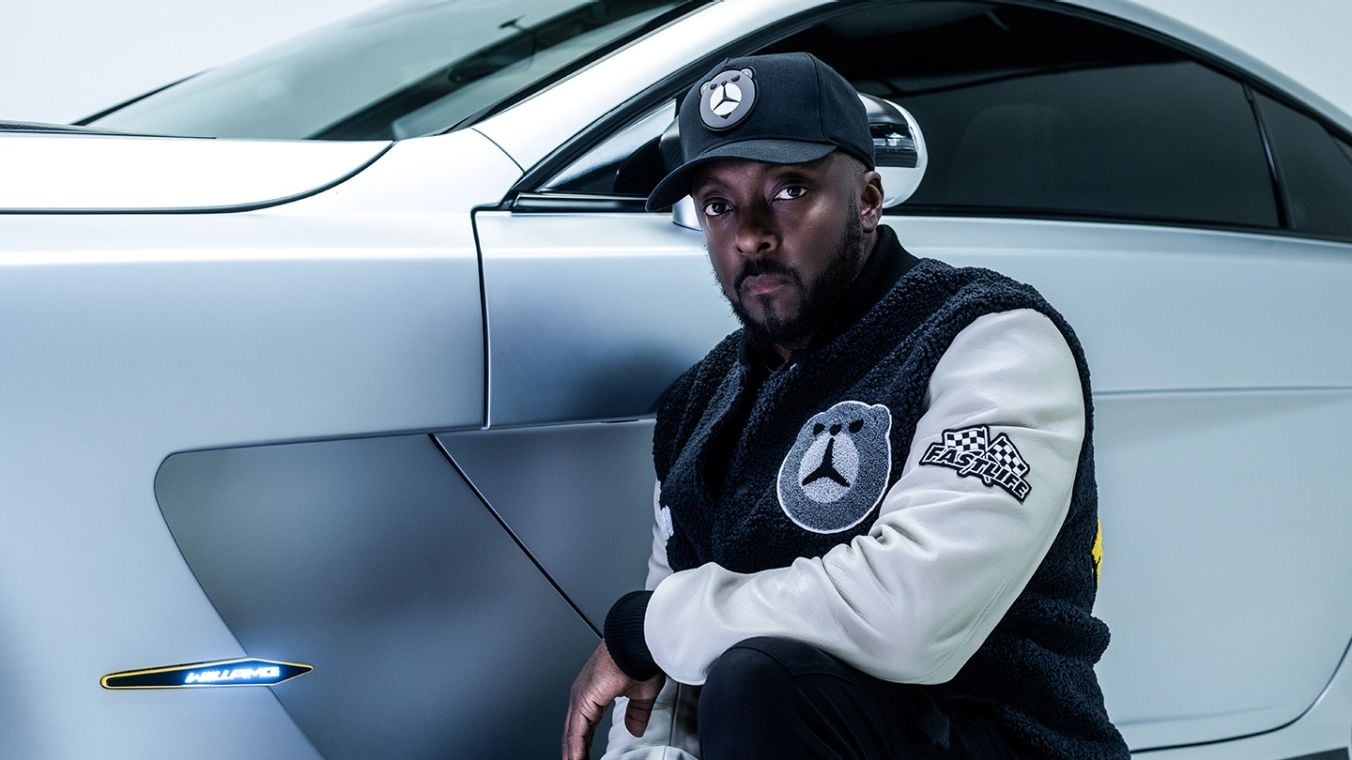 Musician will.i.am poses in front of the custom four-wheel 