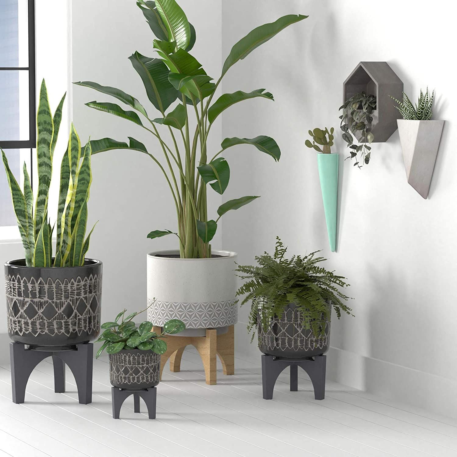 Global Stoneware Planter with Black Wood Stand, as featured in Amazon's 2021 Big Winter Sale.