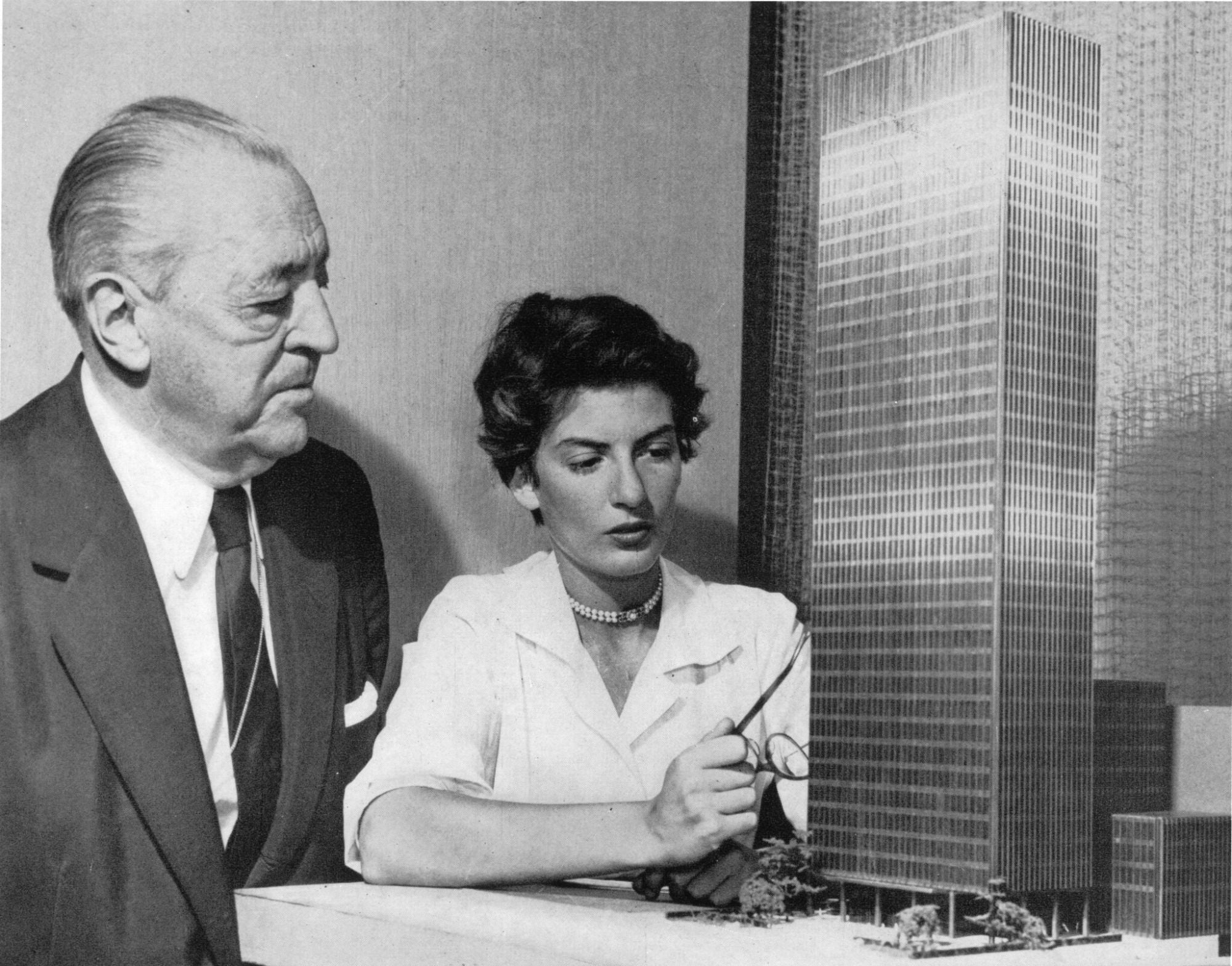 Architects Phyllis Lambert and Ludwig Mies van der Rohe work together on a project. 