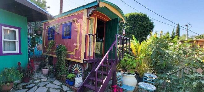 colorful tiny home with wagon elements