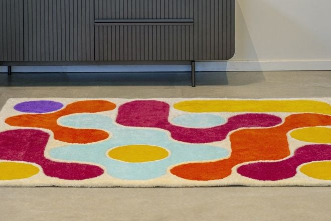 Fluid shapes and patterns adorn the Sosomo Rug Collection's 