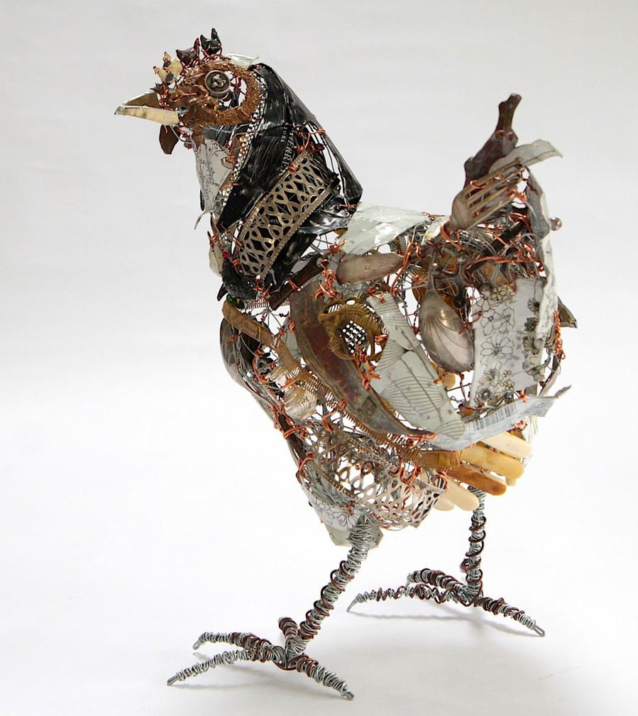 An intricate upcycled metal hen by artist Barbara Franc.