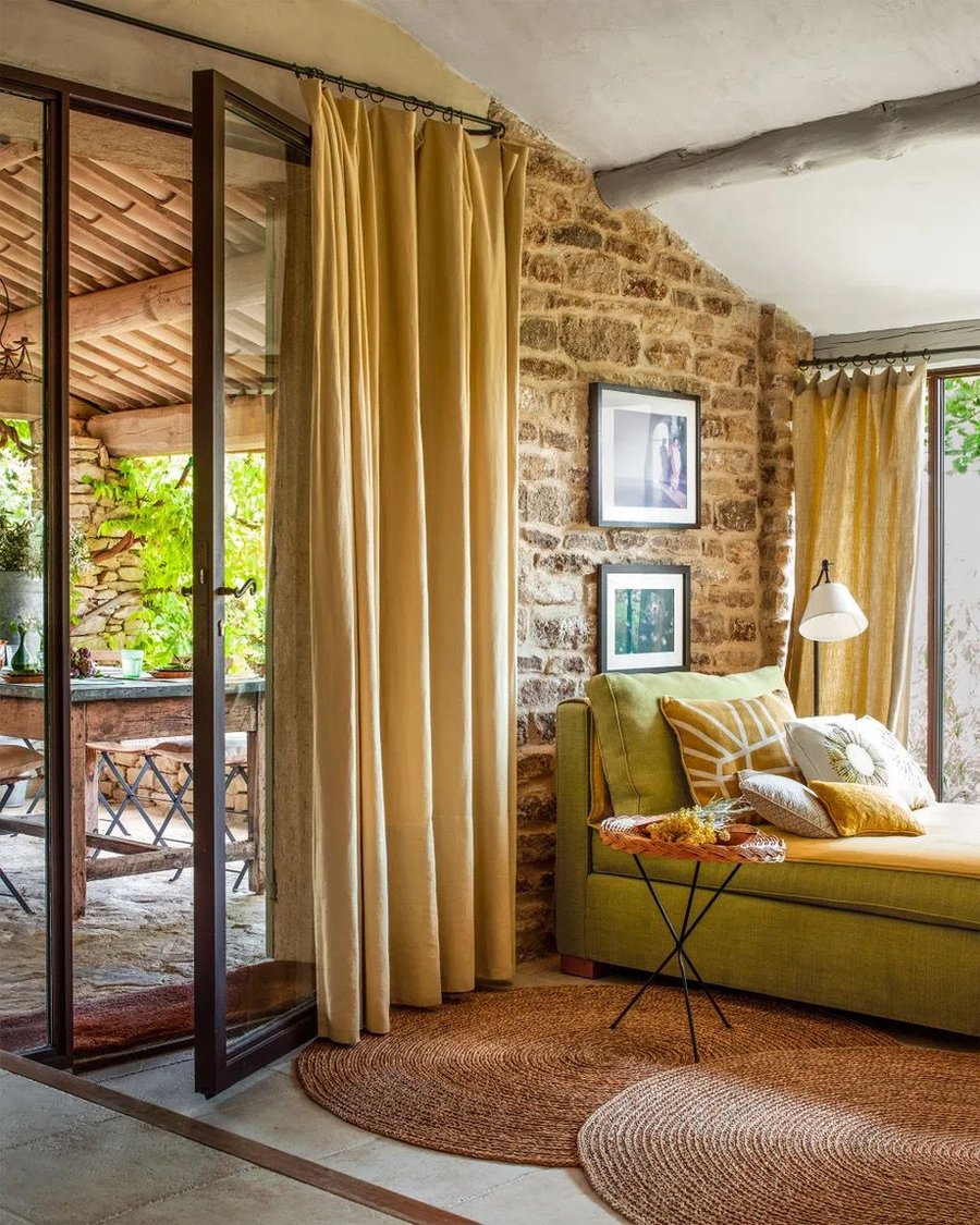 Lovely breezy sitting area in the Pierre Frey French countryside farmhouse. 