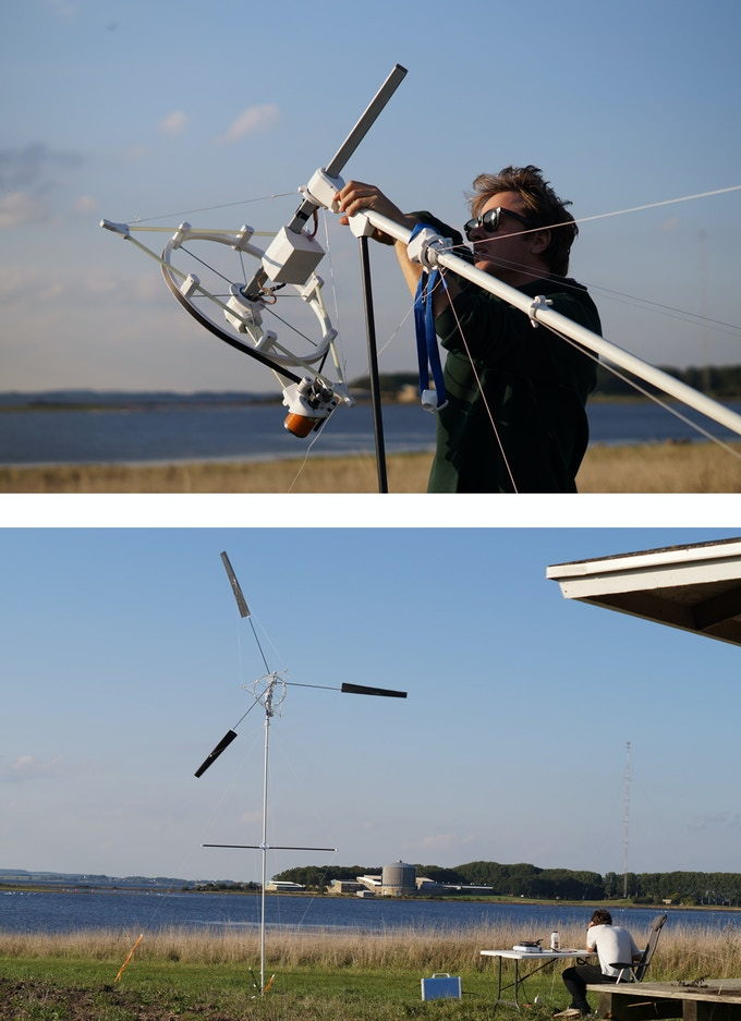 Man sets up a Wind Catcher lightweight travel turbine to power his devices on the go.